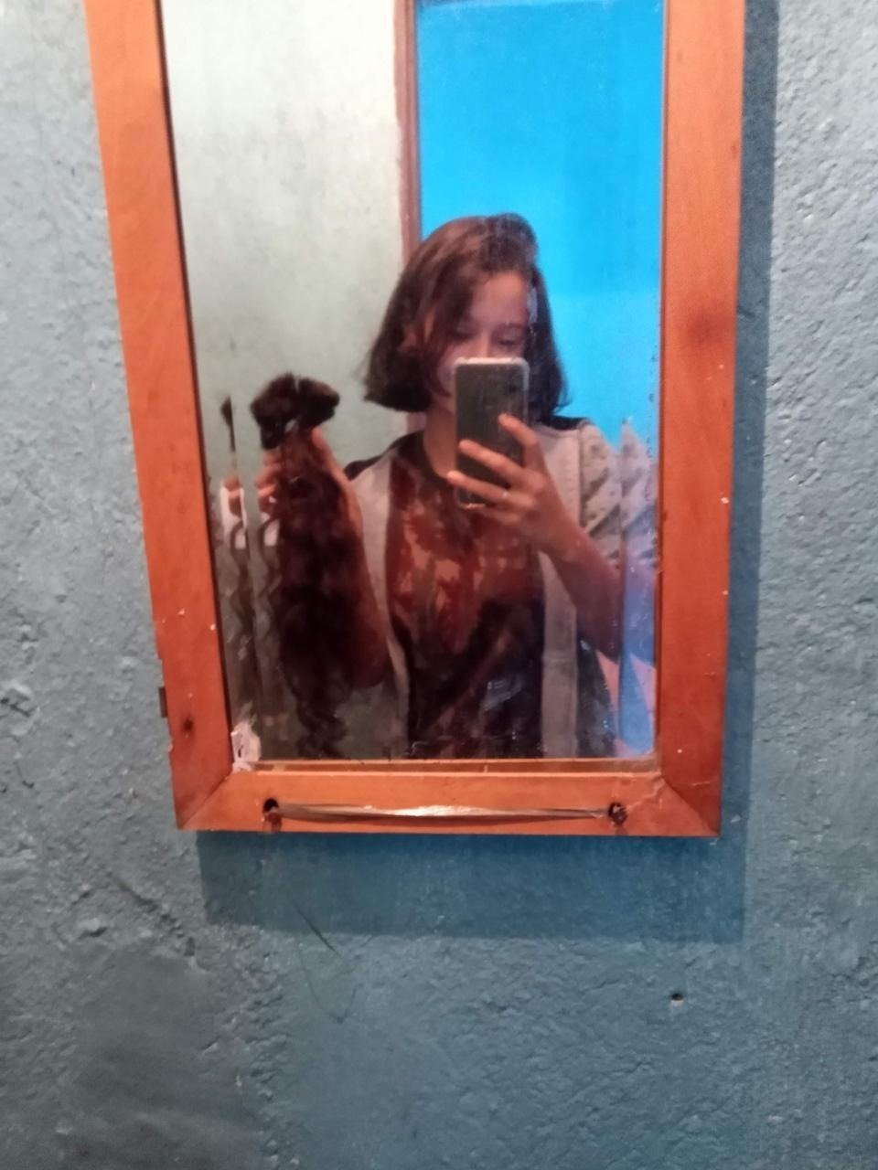 Renata aos 18 anos no espelho